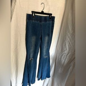 Flared jeans. Brand unknown.